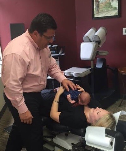 Dr. Outten Spinal Adjustment to infant in Cary, NC